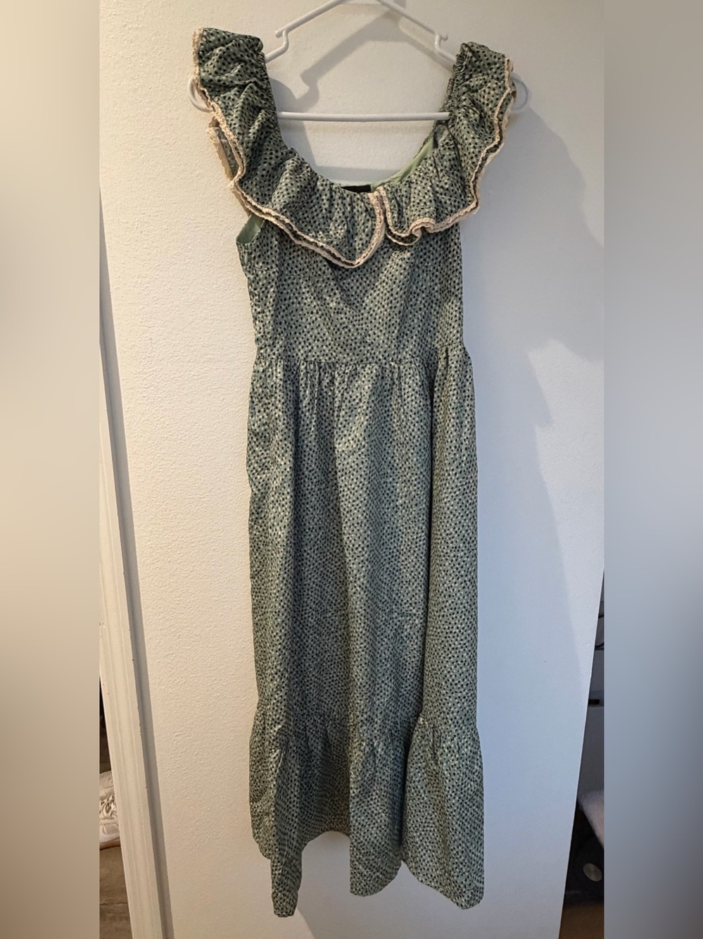 sage green dress featuring a small dark ditsy floral print